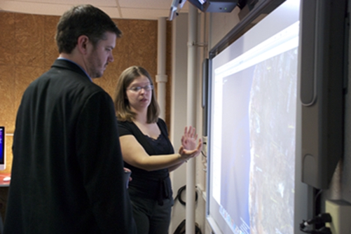 Teachers are learning to use a smartboard.